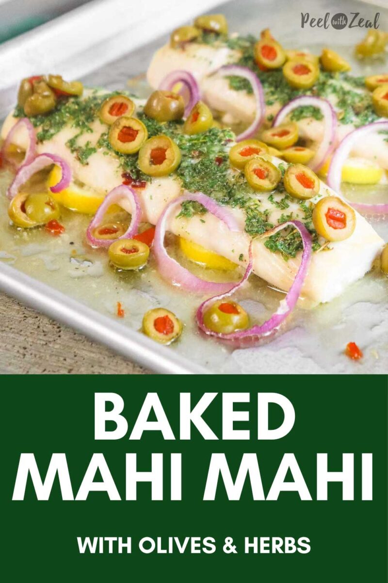 baked mahi fillets with olives and onion on a sheet pan