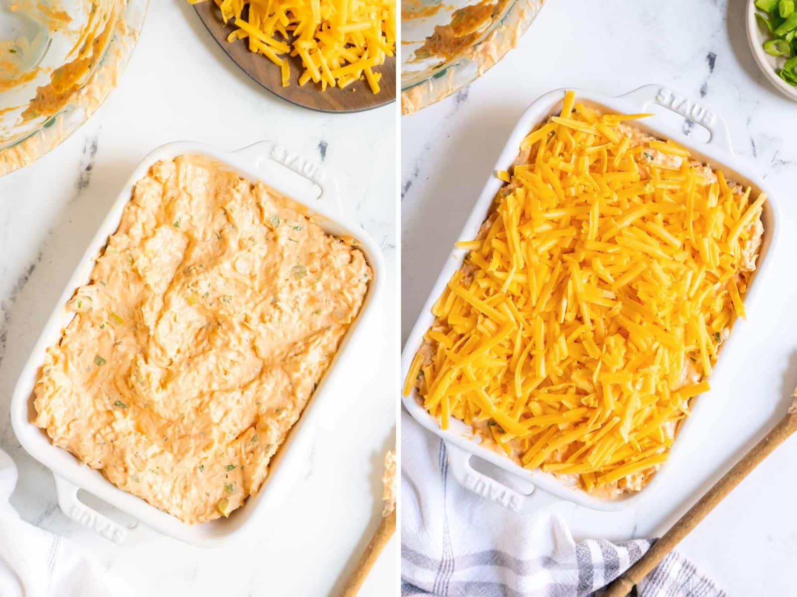 Side-by-side images of a baking dish with healthy buffalo chicken dip, left without topping, right covered with shredded cheddar, on a marble surface with a wooden spoon and green onions nearby.