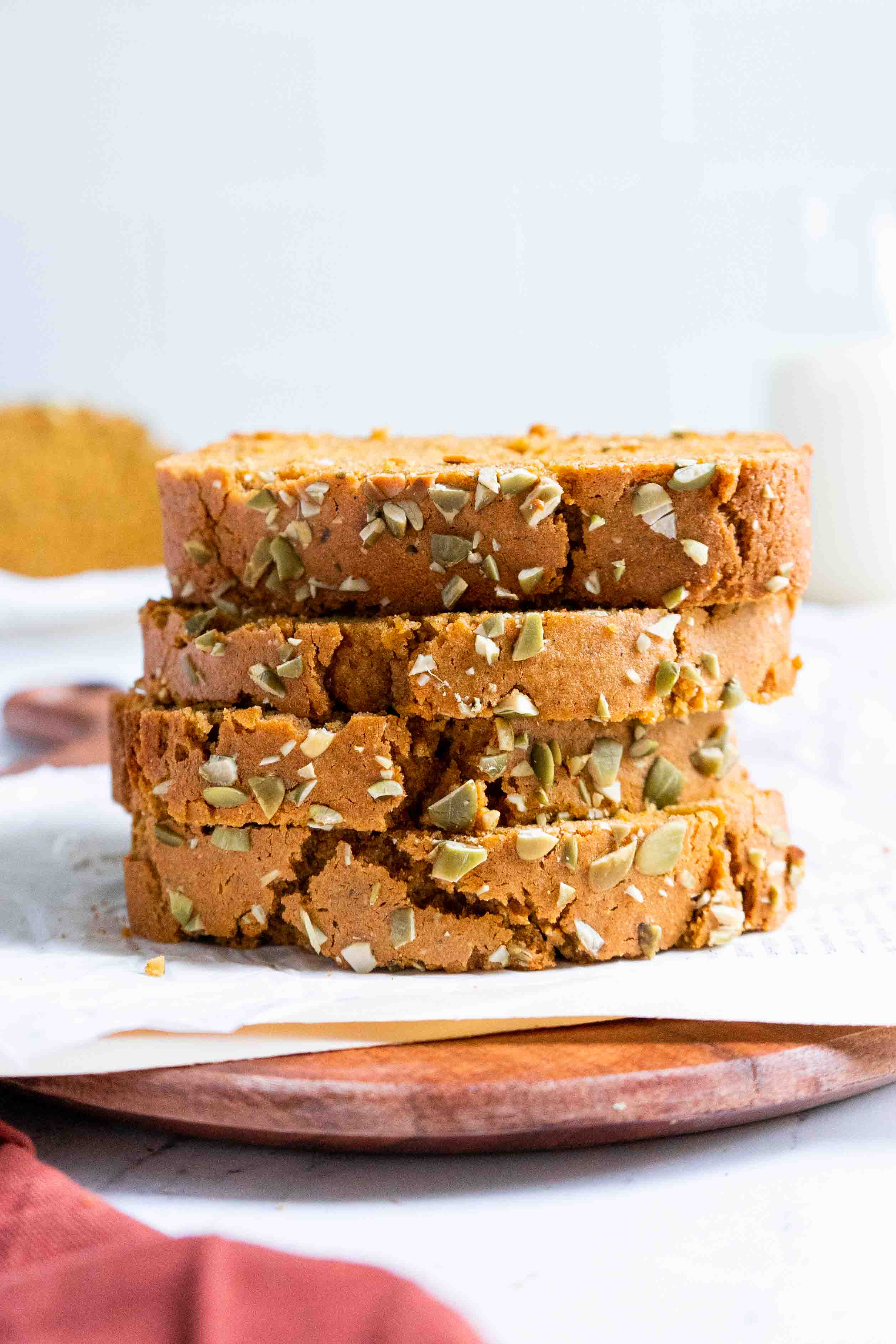 4 slicers of pumpkin bread stacked