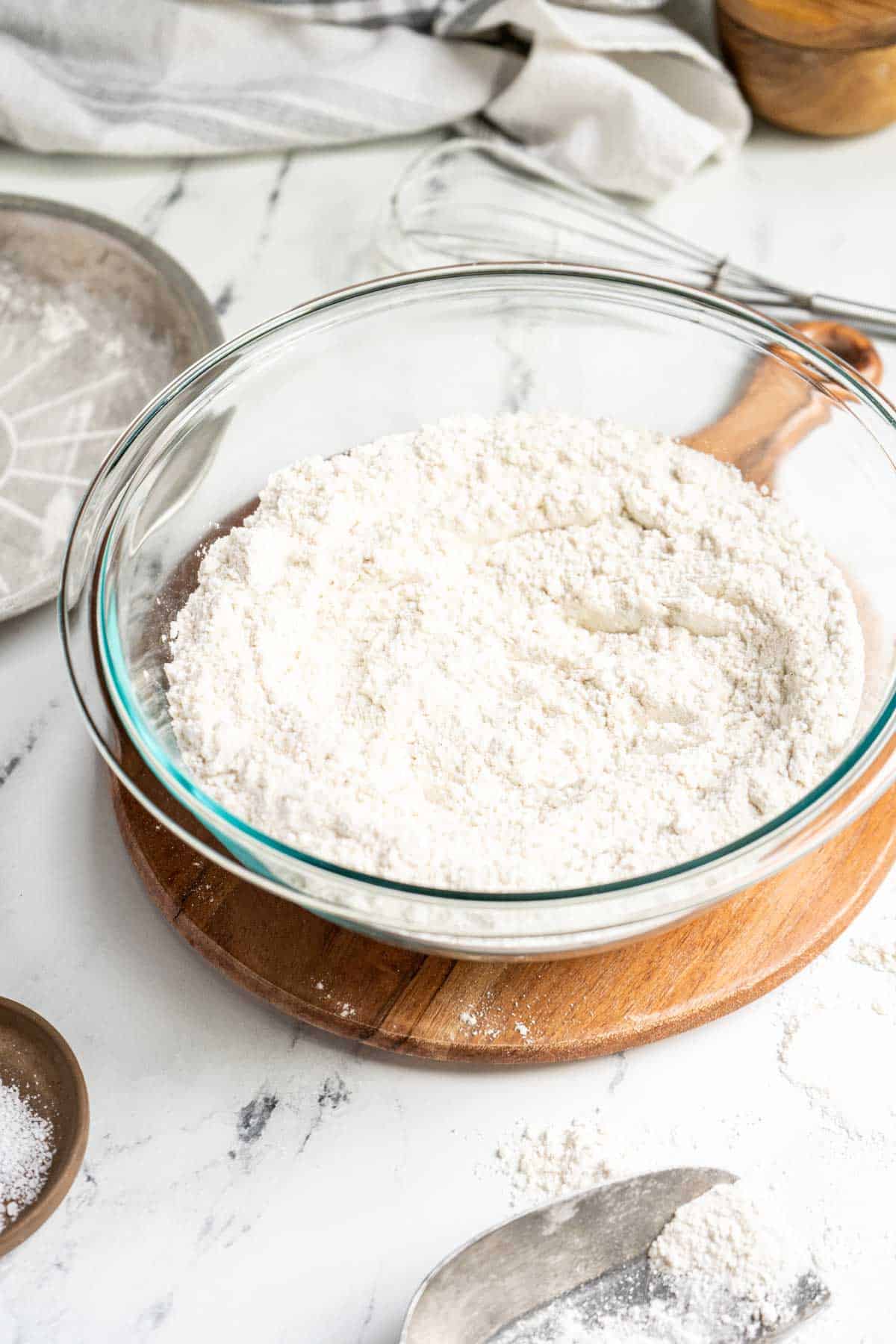 Flour in a bowl on a counter.