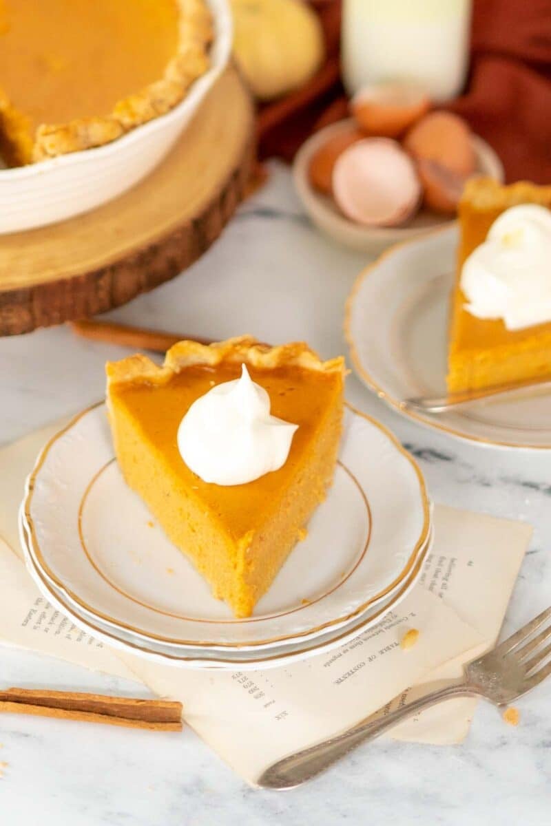 Slice of pie with whipped cream.