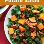 Kale salad with sweet potatoes on a plate.