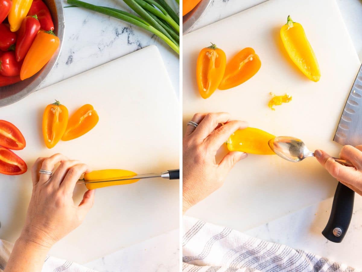 Hands deftly cutting and scooping seeds from yellow mini bell peppers on a white cutting board, surrounded by other peppers, a knife, and a bowl of tangy cream cheese stuffing ready to be used.