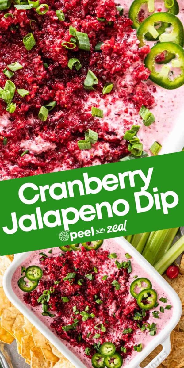 A rectangular dish filled with tangy cranberry jalapeno dip, garnished with sliced jalapenos and chopped green onions, surrounded by chips and celery sticks.
