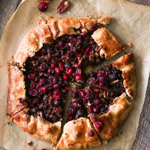 Pie sliced on parchment paper.