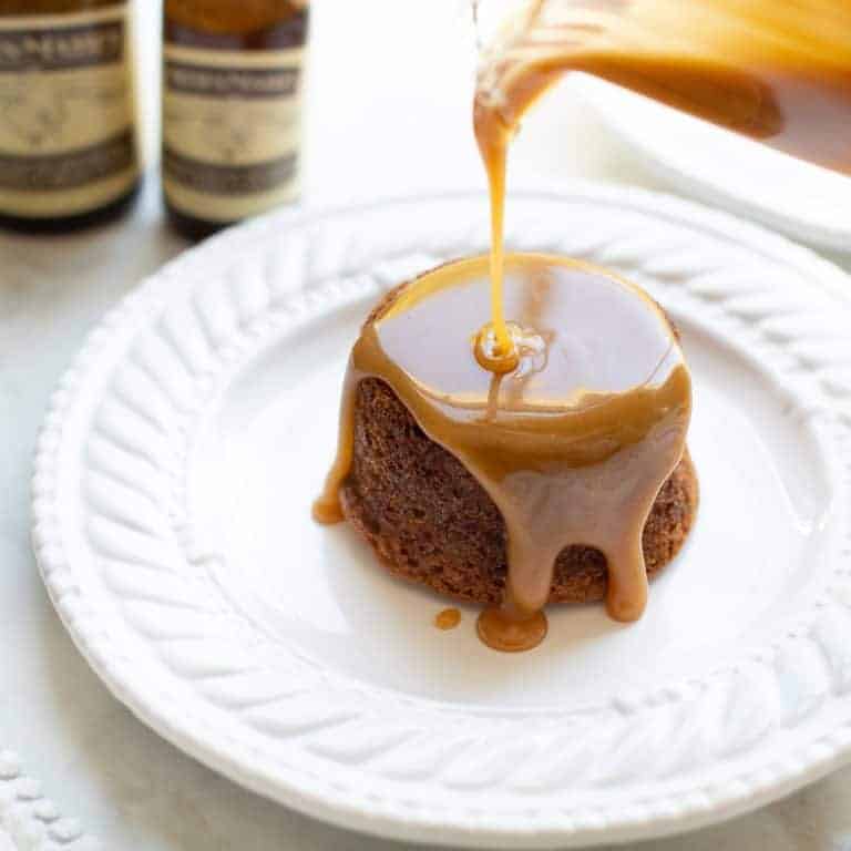 Pouring glaze on toffee pudding.