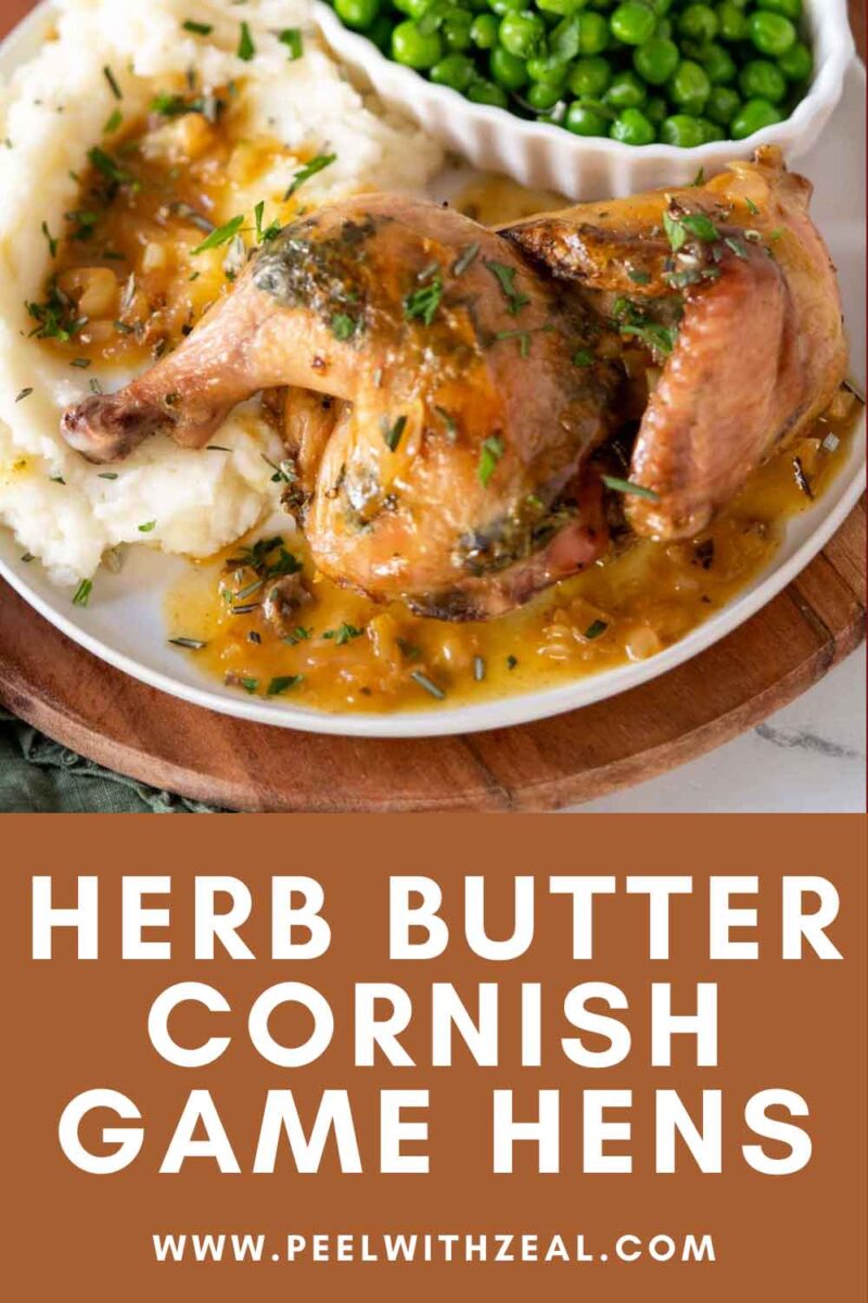 Roasted cornish hens on a plate with gravy.
