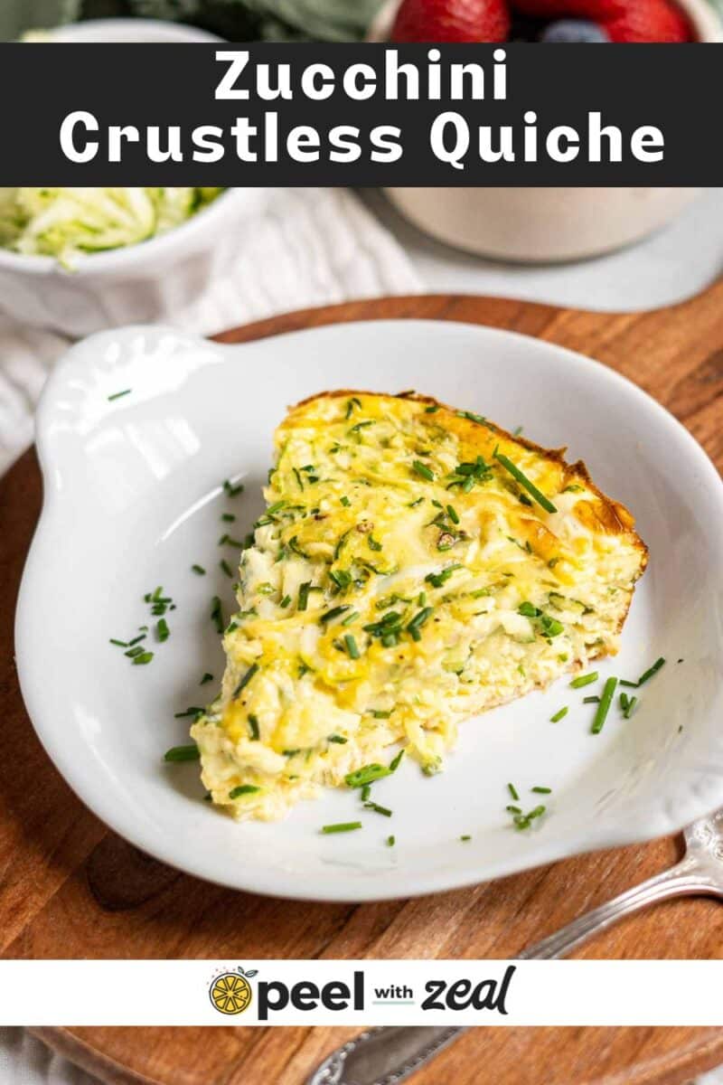 A slice of zucchini crustless quiche graces the plate, delicately garnished with fresh chives, while bowls brimming with vibrant ingredients linger invitingly in the background.