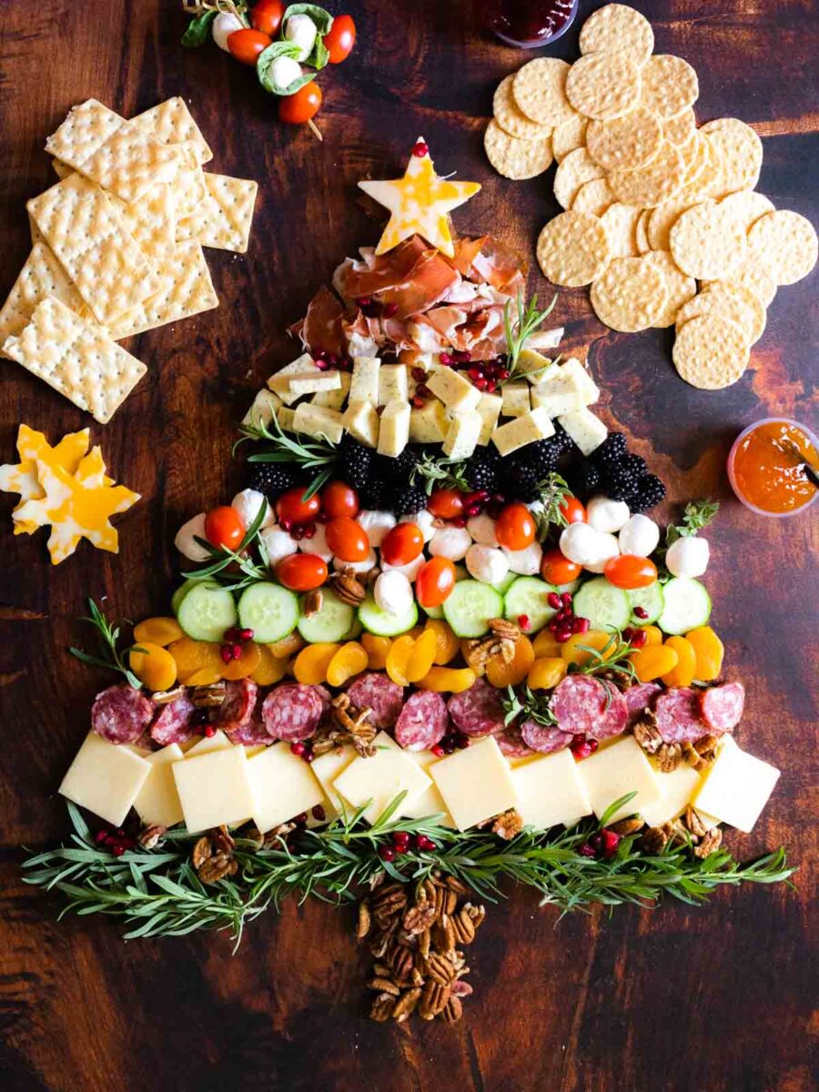Christmas cheese board with veggies and fruit.