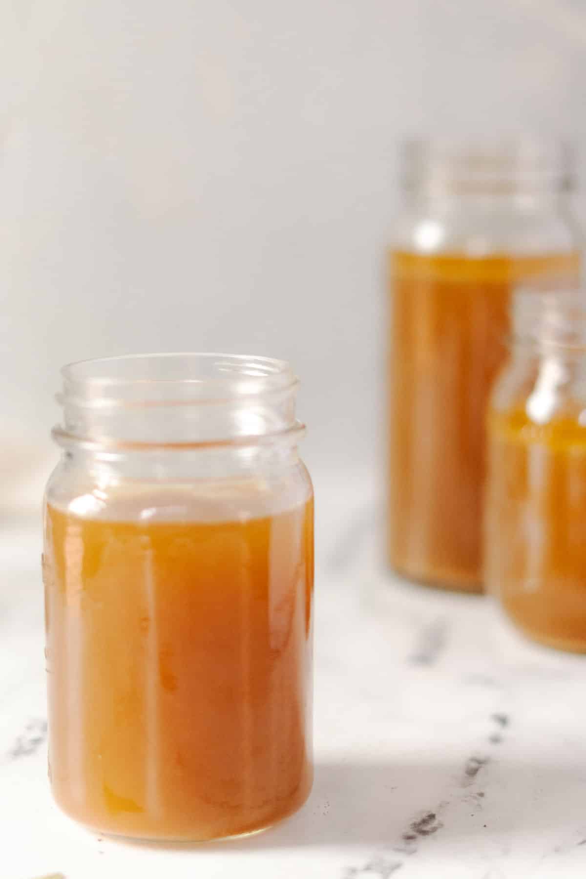 Turkey broth in a mason jar.