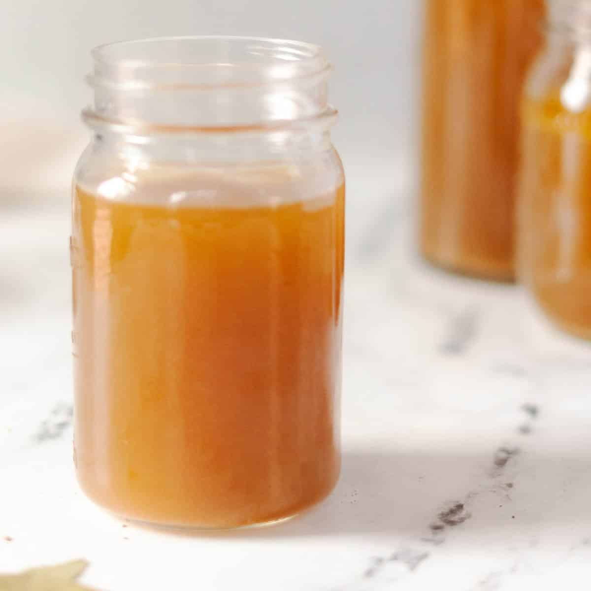 Turkey broth in a mason jar.