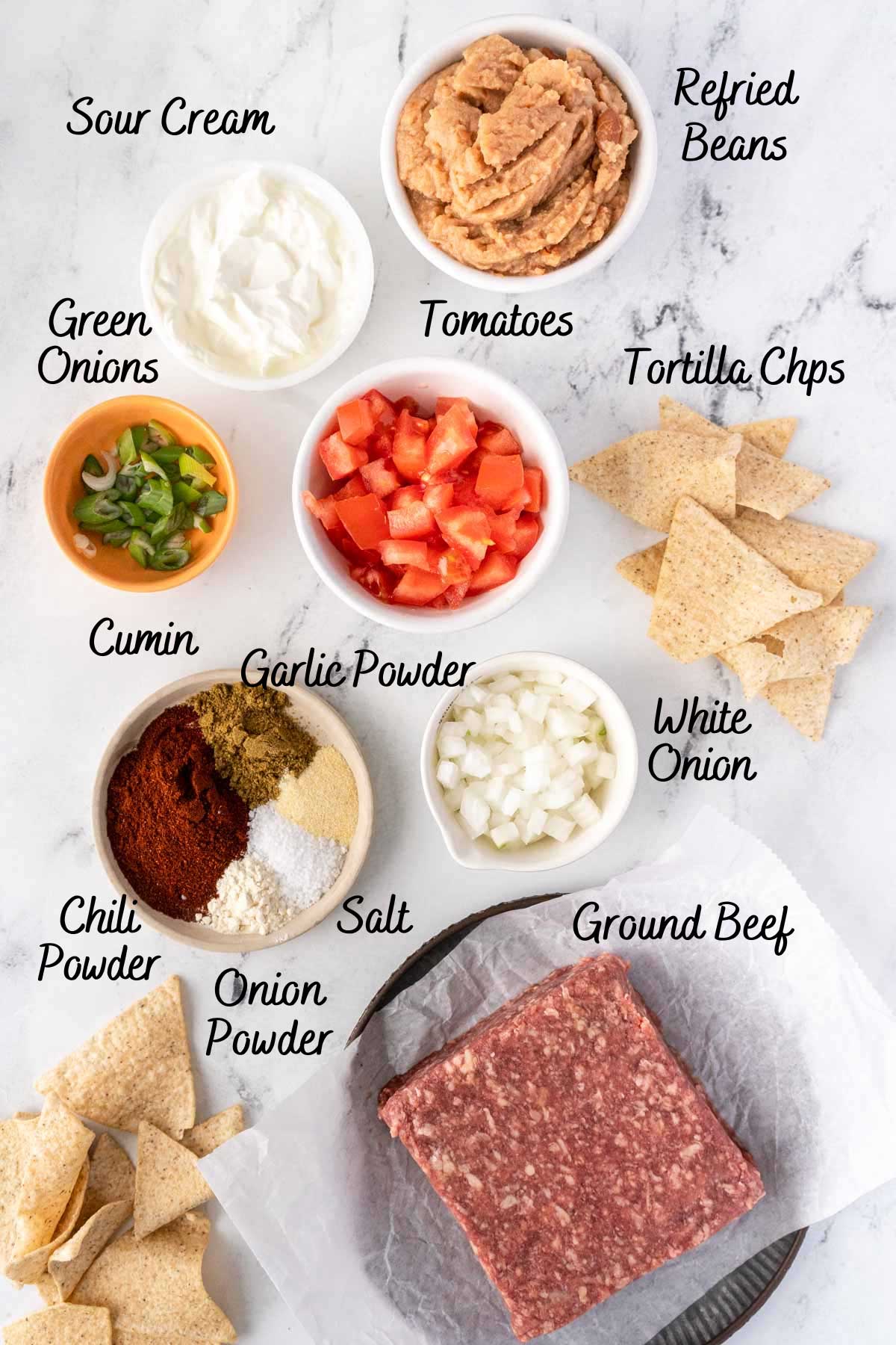 Beef nacho ingredients on a counter.