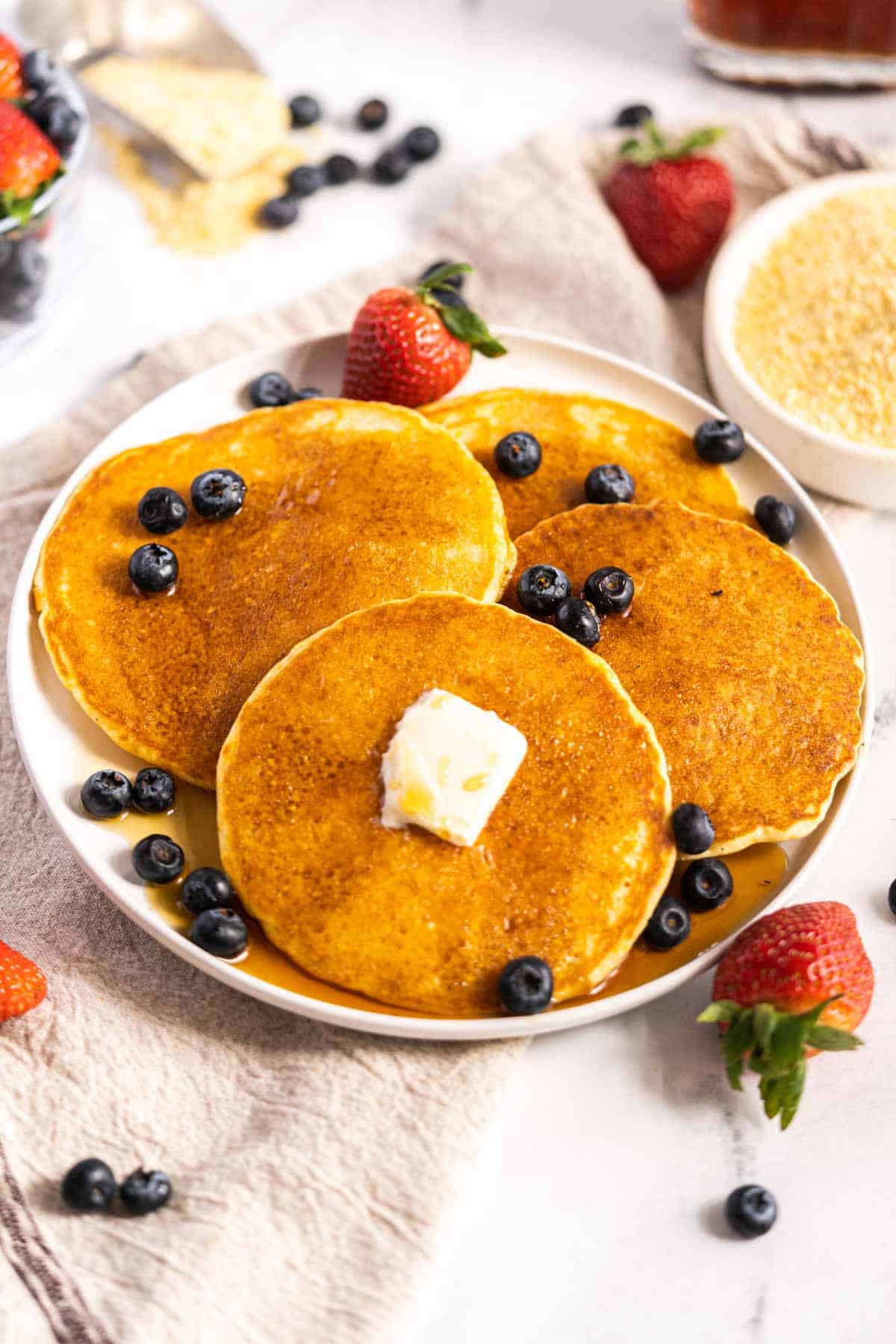 Plate with pancakes and fruit.