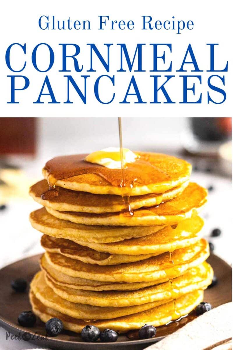 Syrup on stack of cornmeal pancakes.