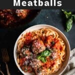 Pasta and meatballs in a bowl.