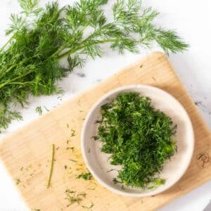 Chopped fresh dill in a bowl.