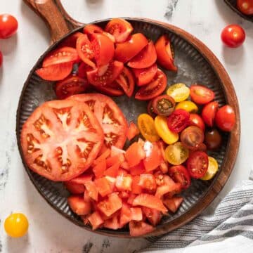 Chopped tomatoes on a plate.