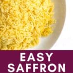 Yellow saffron rice in a serving bowl.