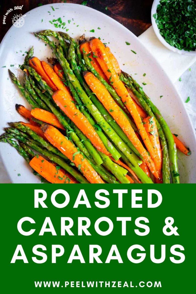 Roasted asparagus and carrots on a serving platter.