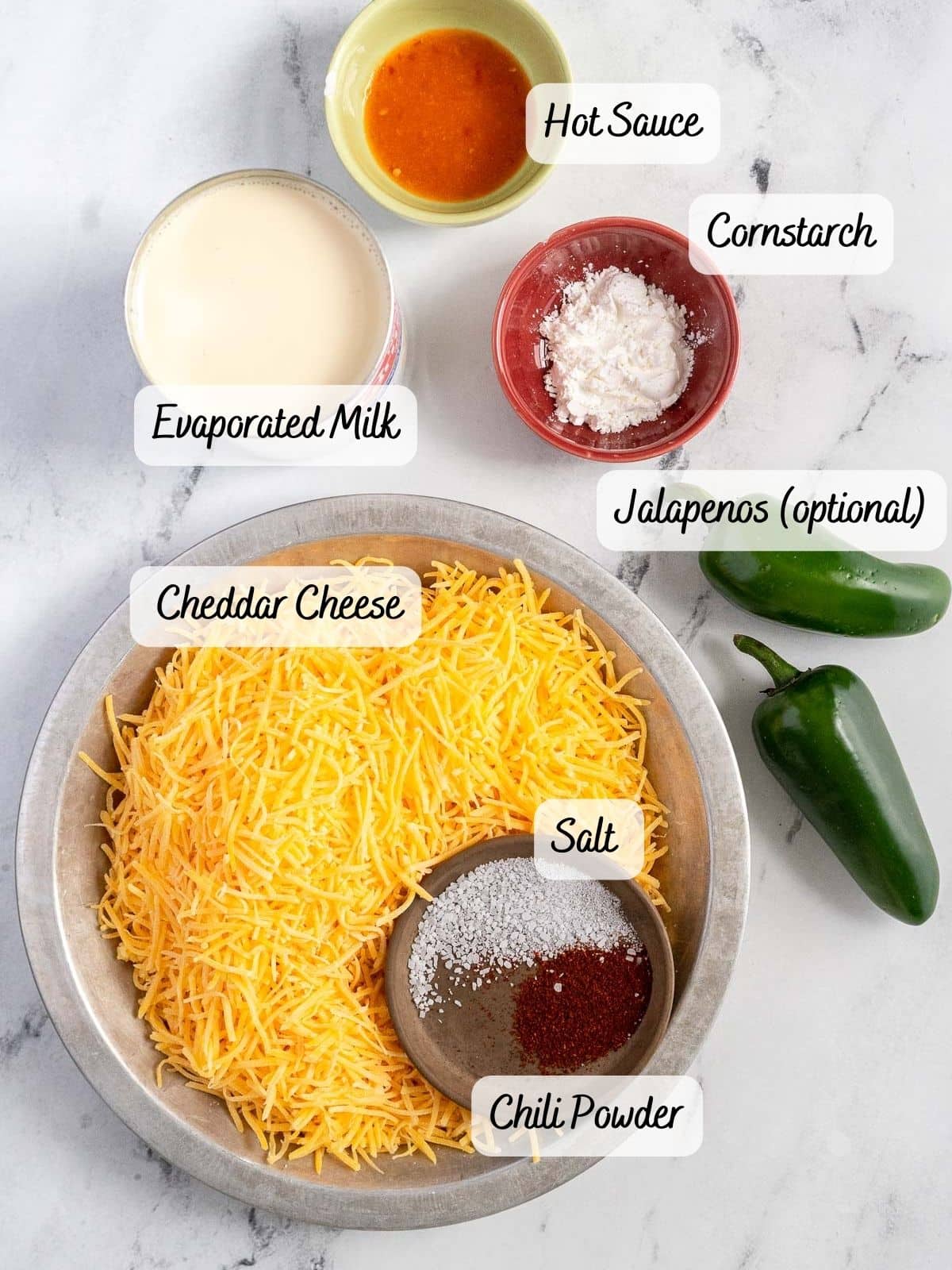 Recipe ingredients on marble counter.