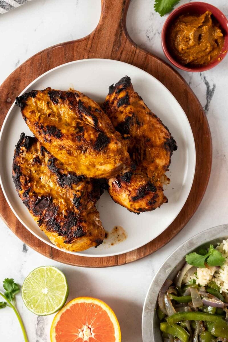 Grilled chicken on a plate.
