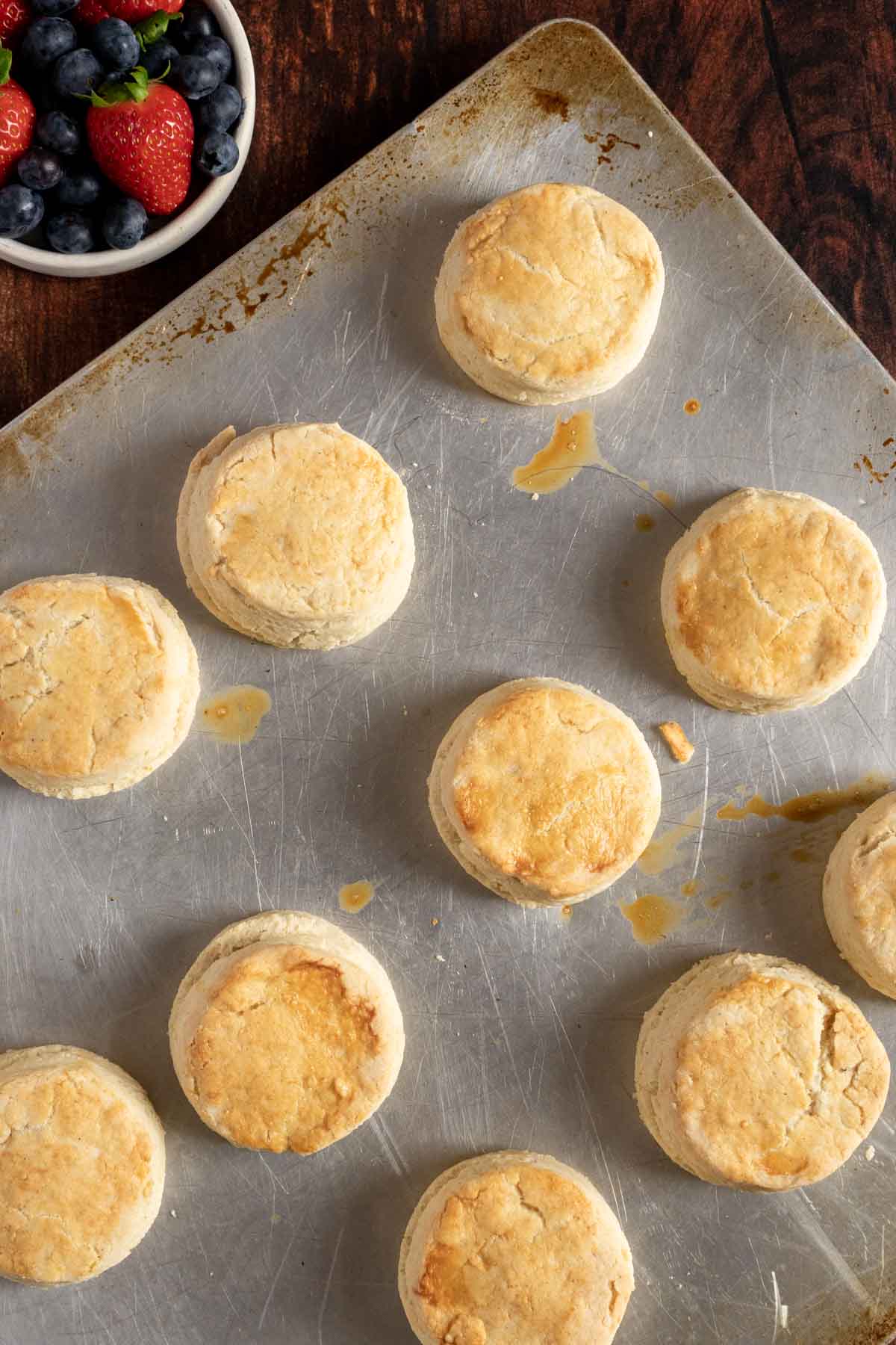 Biscuits cooling on a baking sheet.