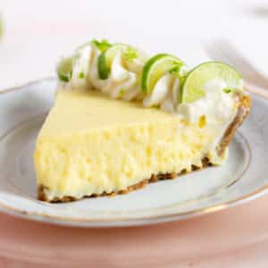 Slice of key lime pie on a plate.