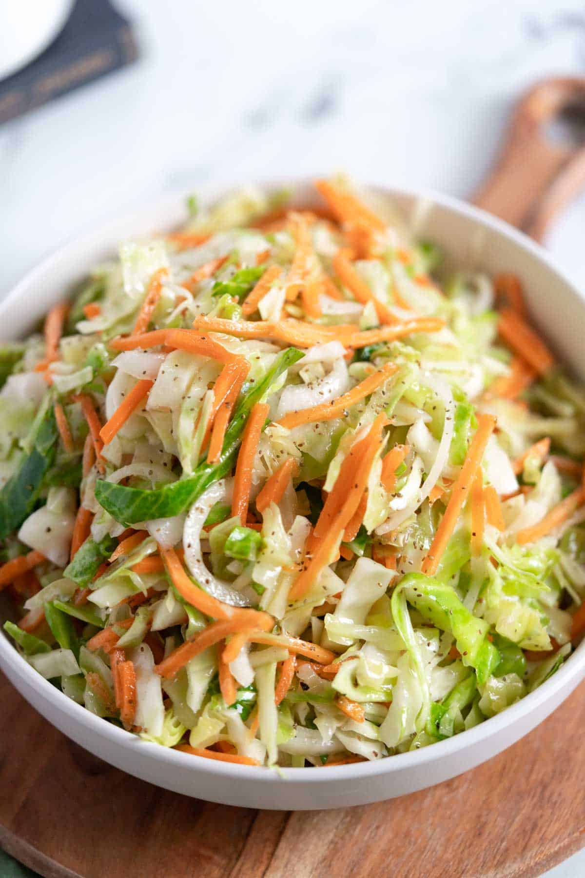 Coleslaw in a serving bowl.