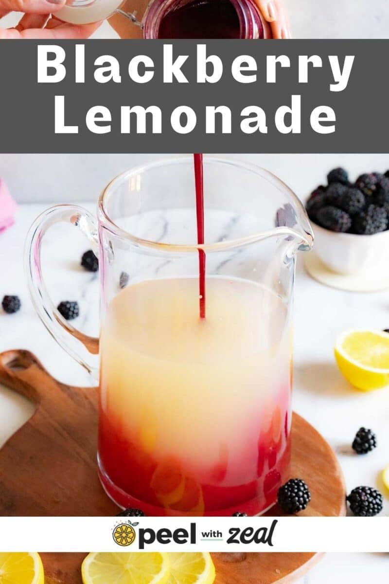 Pouring blackberry syrup into lemonade.