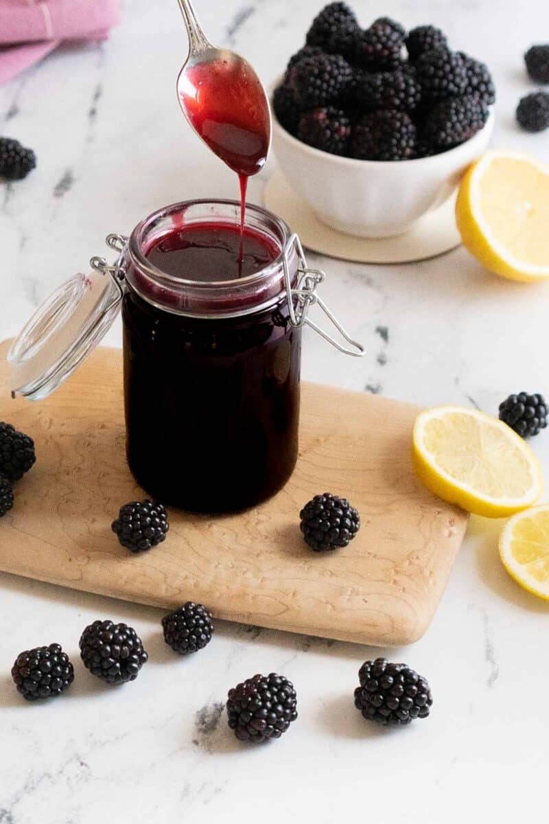 Blackberry syrup in a jar.