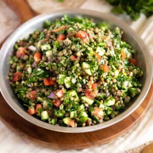 Tabbouleh and lentils in a serving dish.