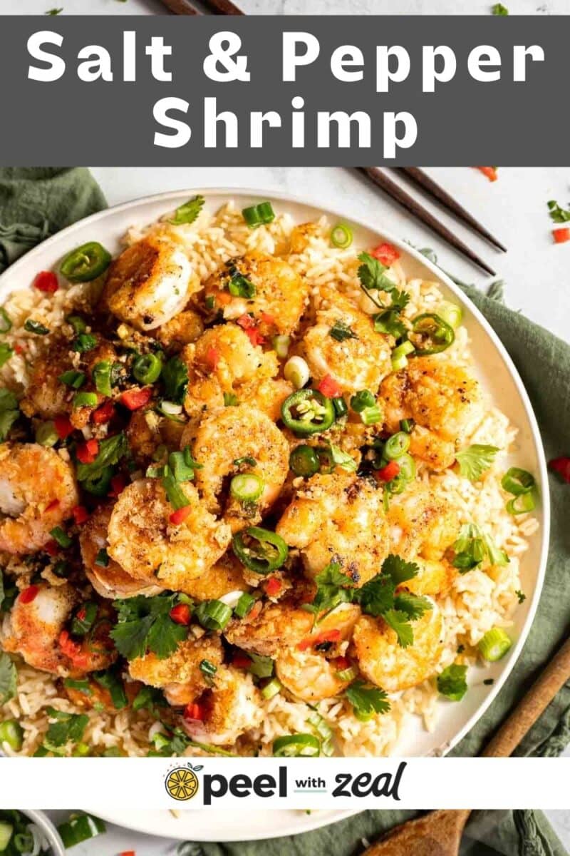 Salt and pepper shrimp served over rice.