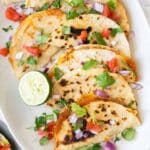 bean tacos on a plate.