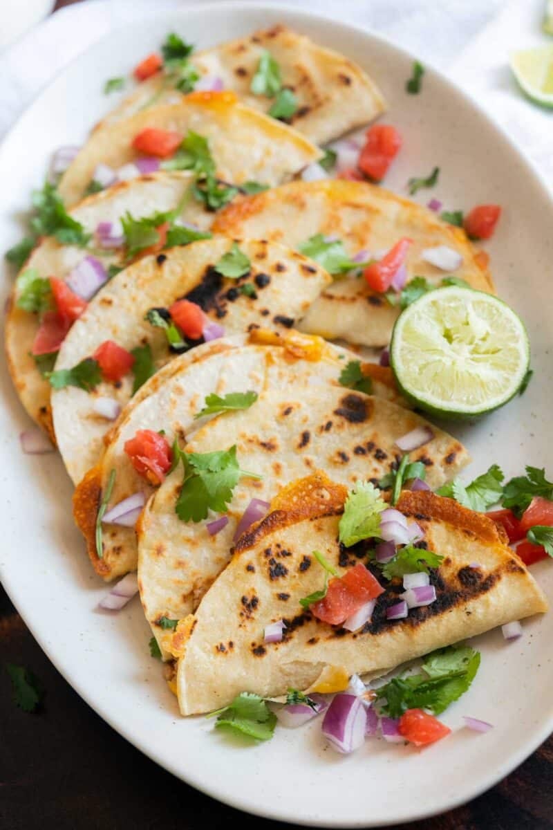 Crispy bean tacos on a plate.