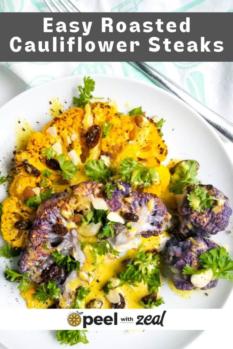 Cauliflower steak on a plate.