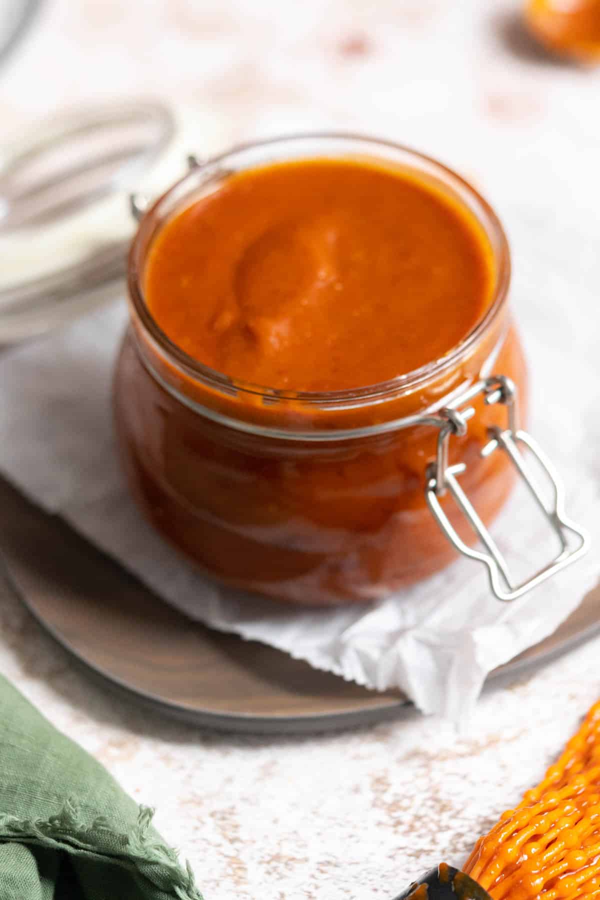 BBQ sauce in a glass jar.