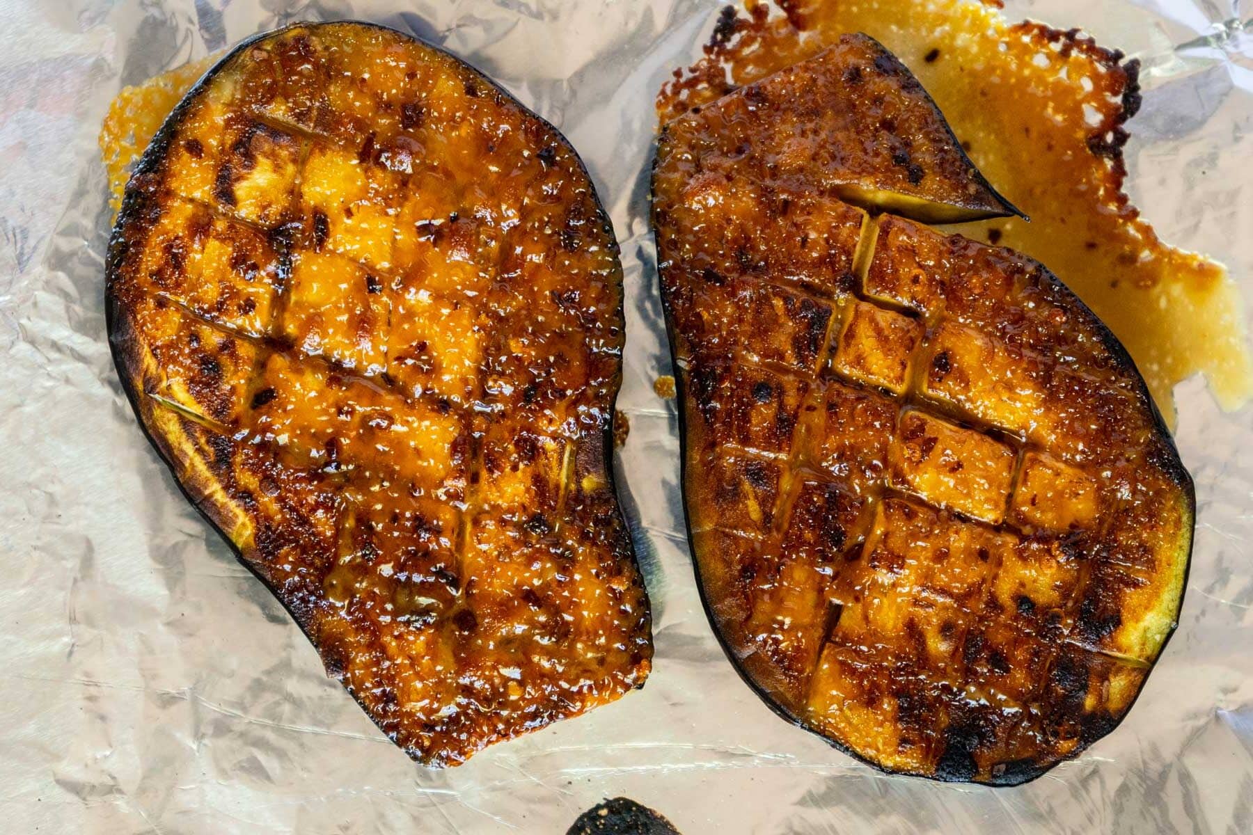 Broiled eggplant on a baking sheet. 
