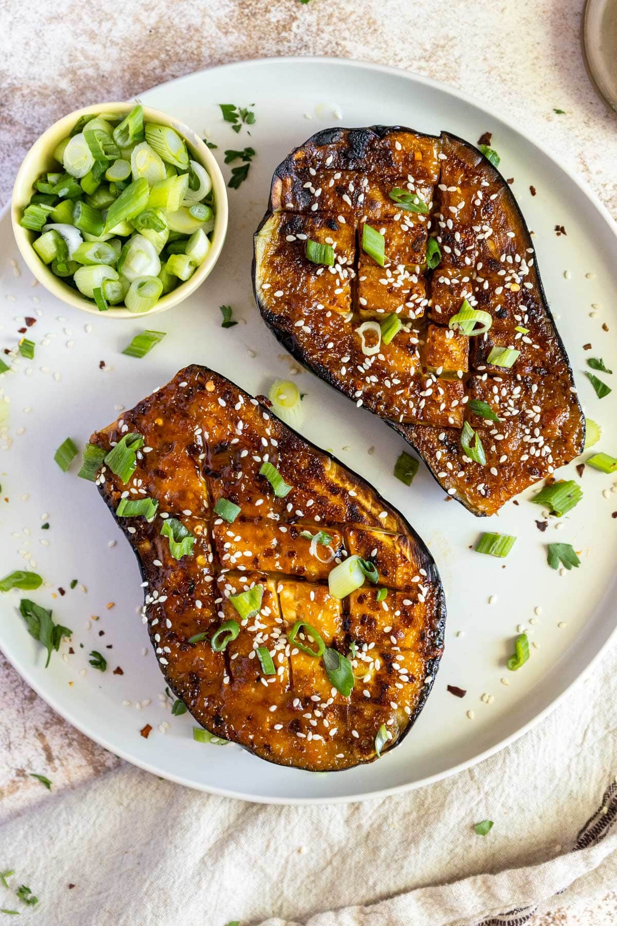 Miso glazed eggplant on a plate.