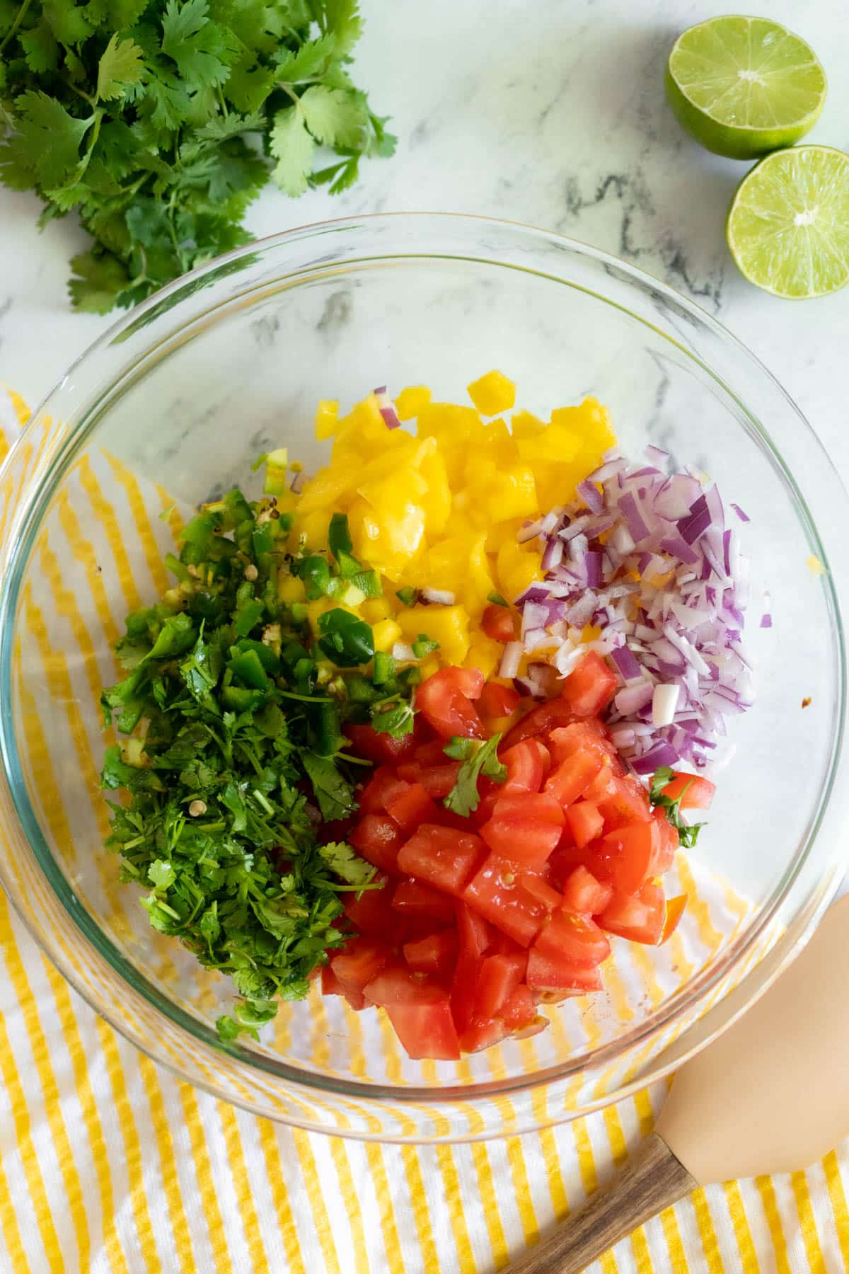 Adding ingredients to mixing bowl.