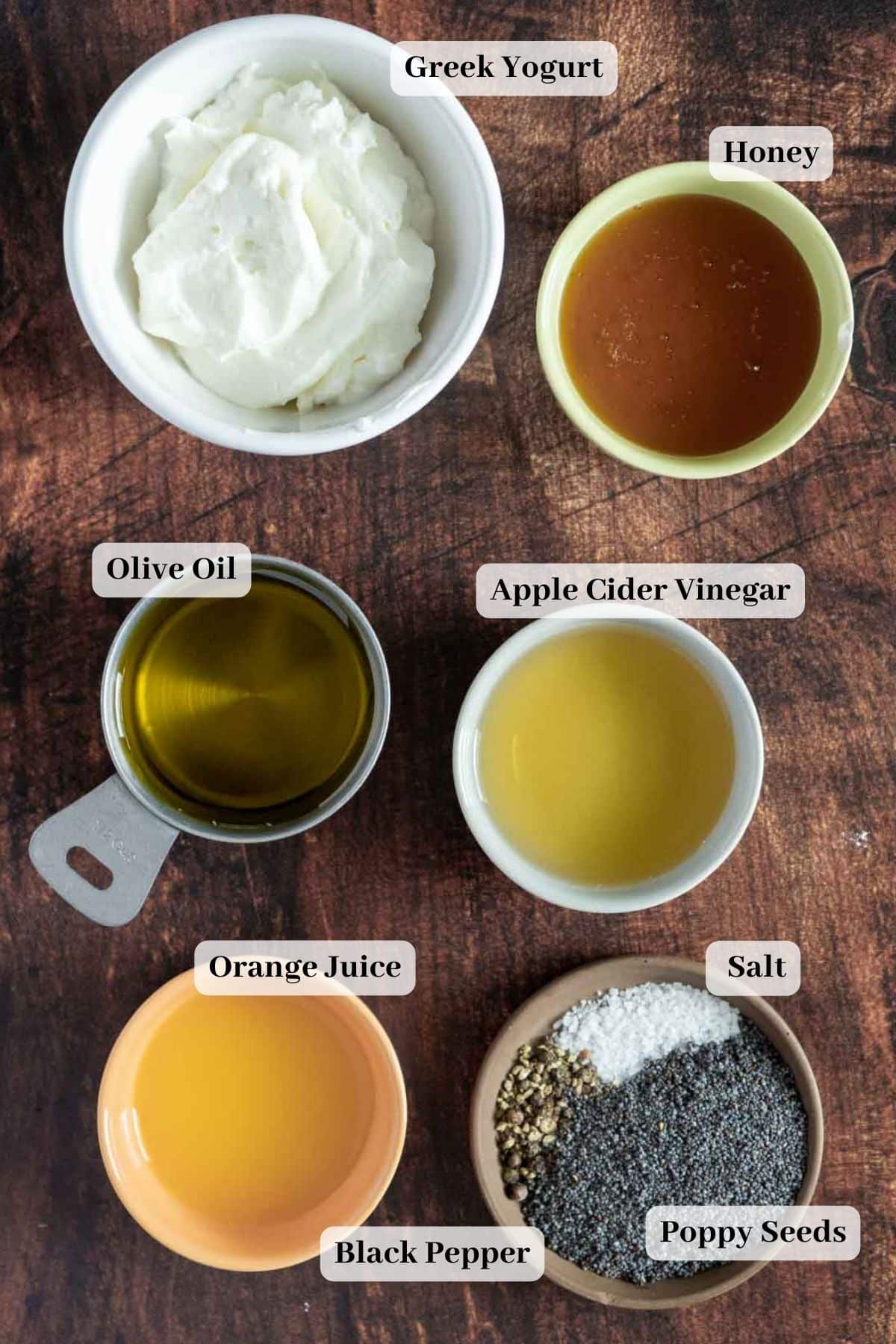 Salad dressing ingredients on a counter.