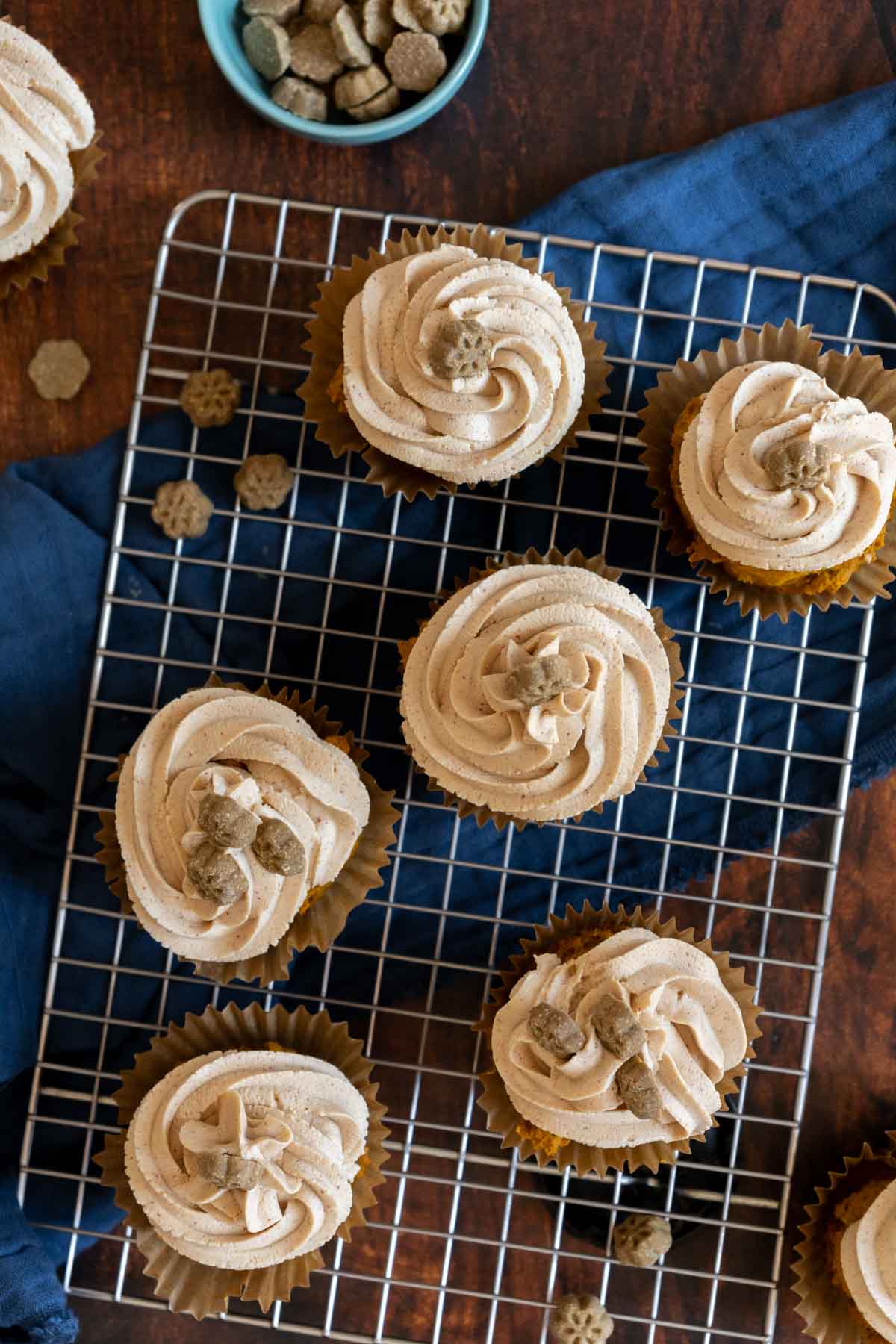 Dog friendly cupcakes on a baking rack.