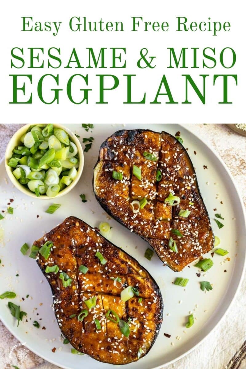 Miso baked eggplant with scallions on a plate.