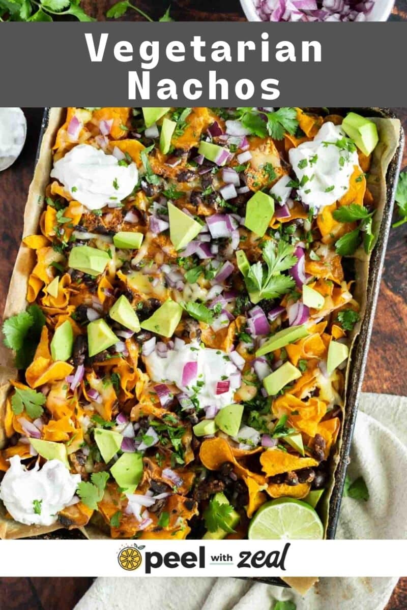 Black bean and sweet potato nachos on a sheet pan.