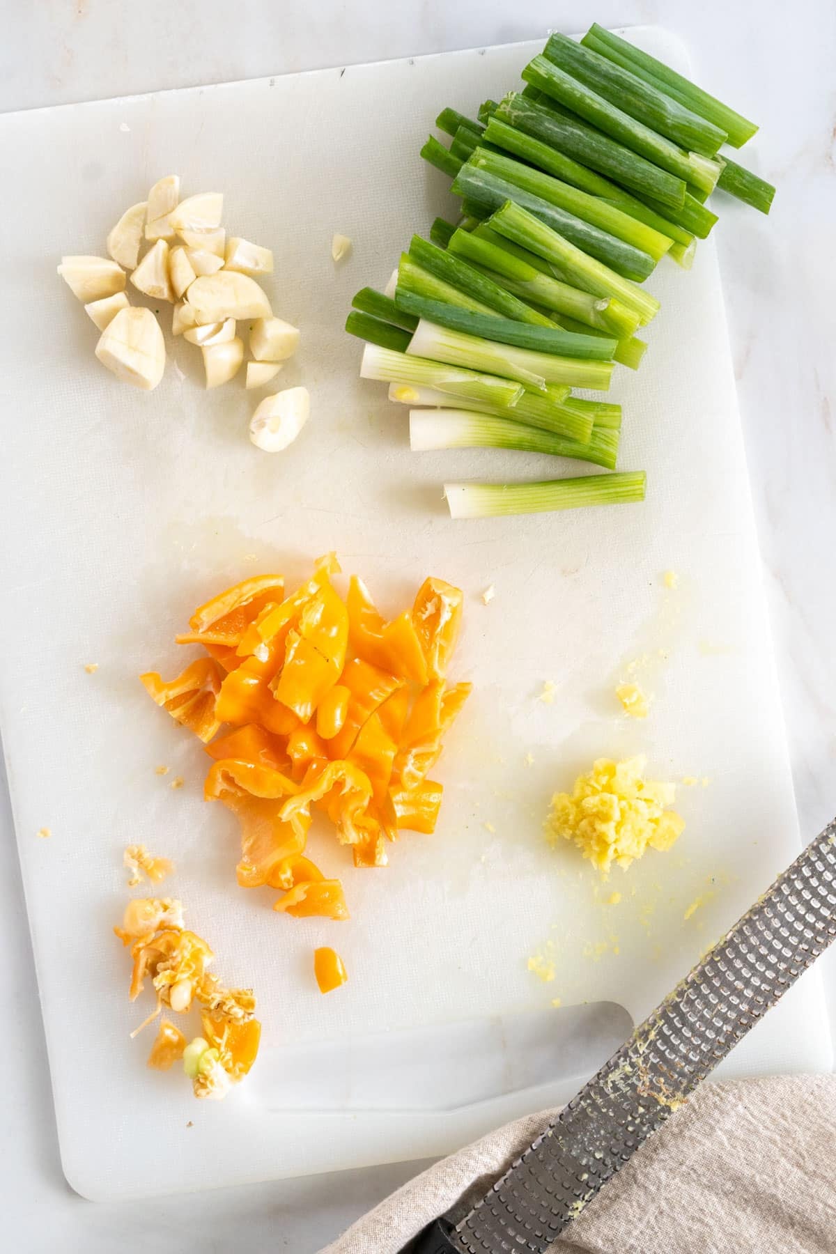 Chopped vegetables on a cutting board.