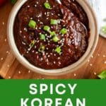 Korean BBQ sauce in a bowl with green onions.