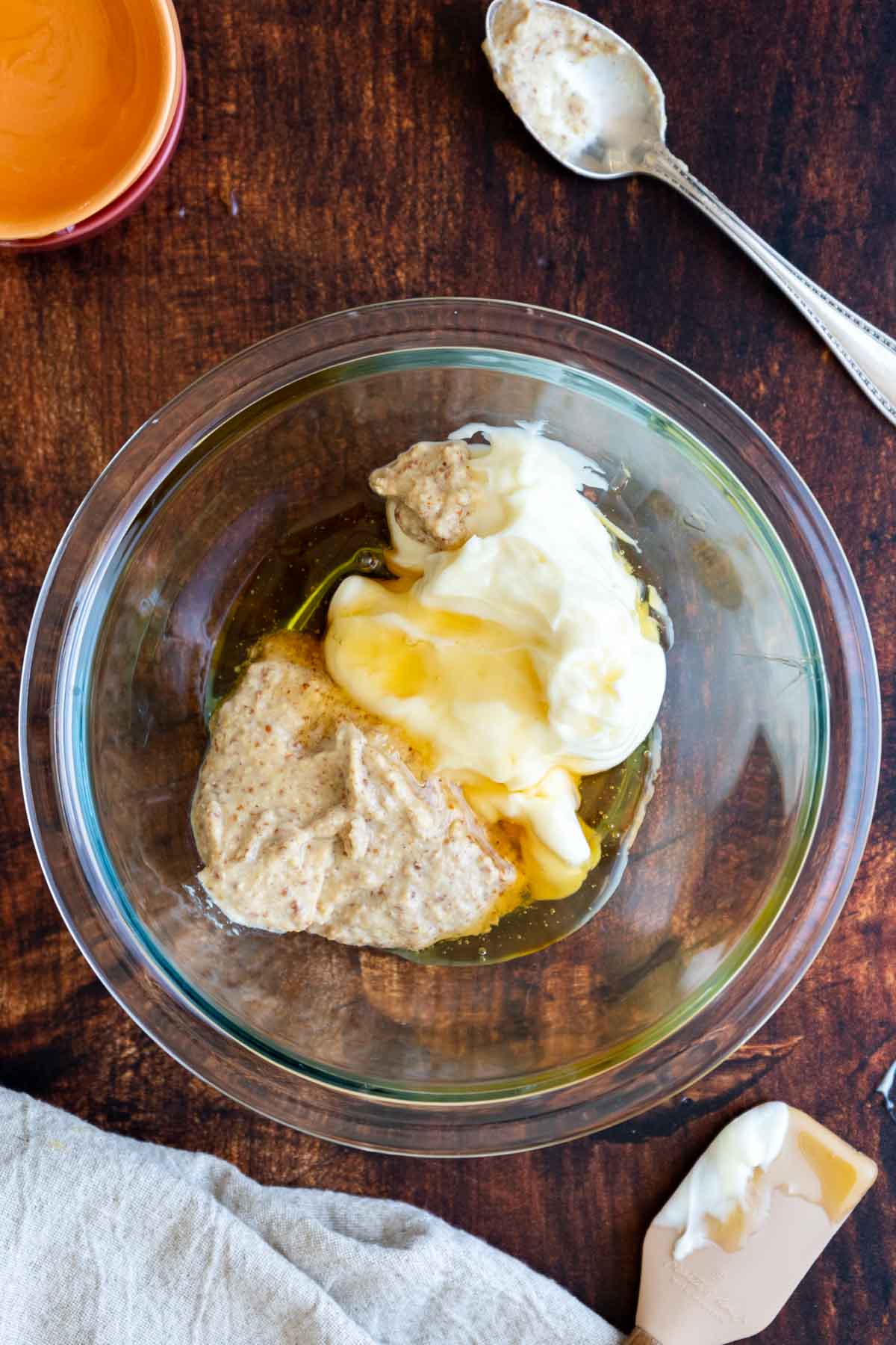 Adding ingredients to mixing bowl.