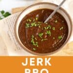 BBQ sauce in a bowl with a spoon