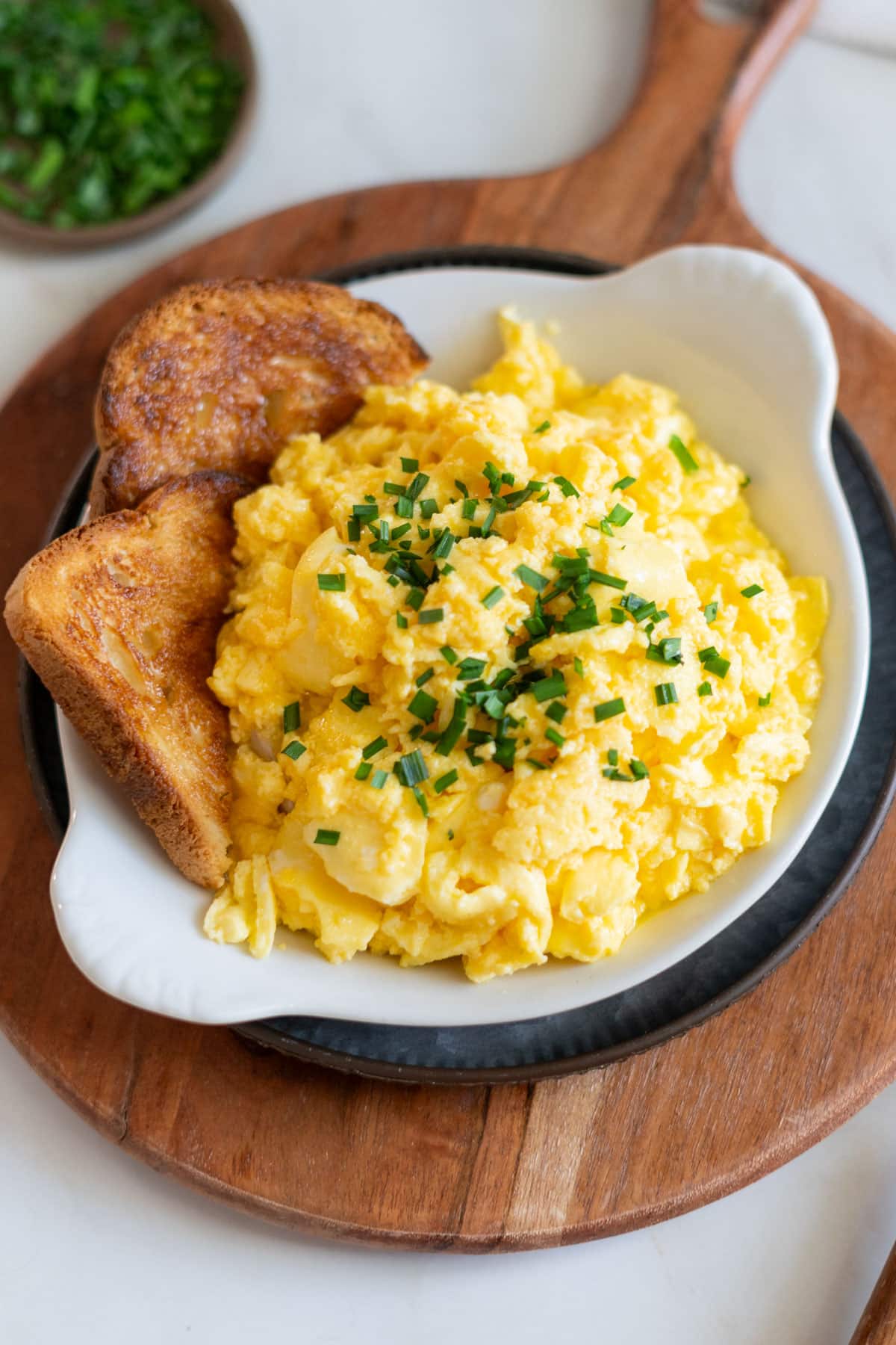 Eggs and toast on a plate.