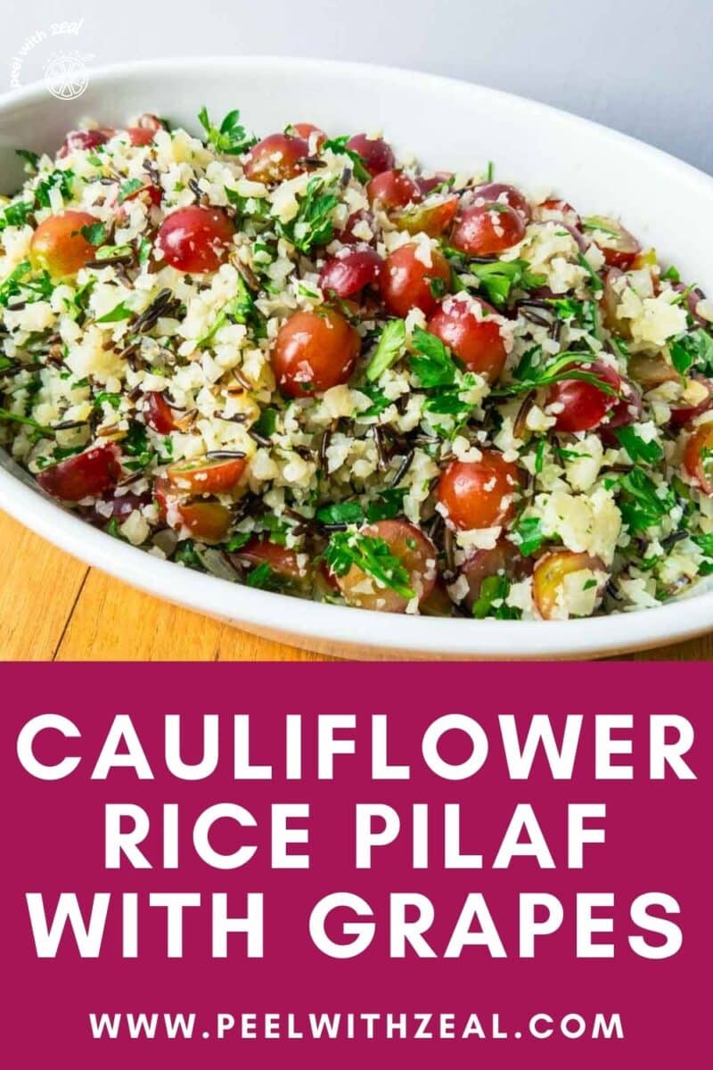 Cauliflower rice pilaf with fresh herbs in a bowl.