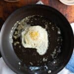 Fried egg in a nonstick pan.